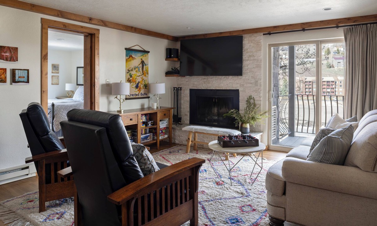 Mount Crested Butte Condo | 4 BDRM, mountain-facing condo, a short walk to the base of Mt. Crested Butte. Two reserved parking spots, a hot tub, sauna, and heated pool.