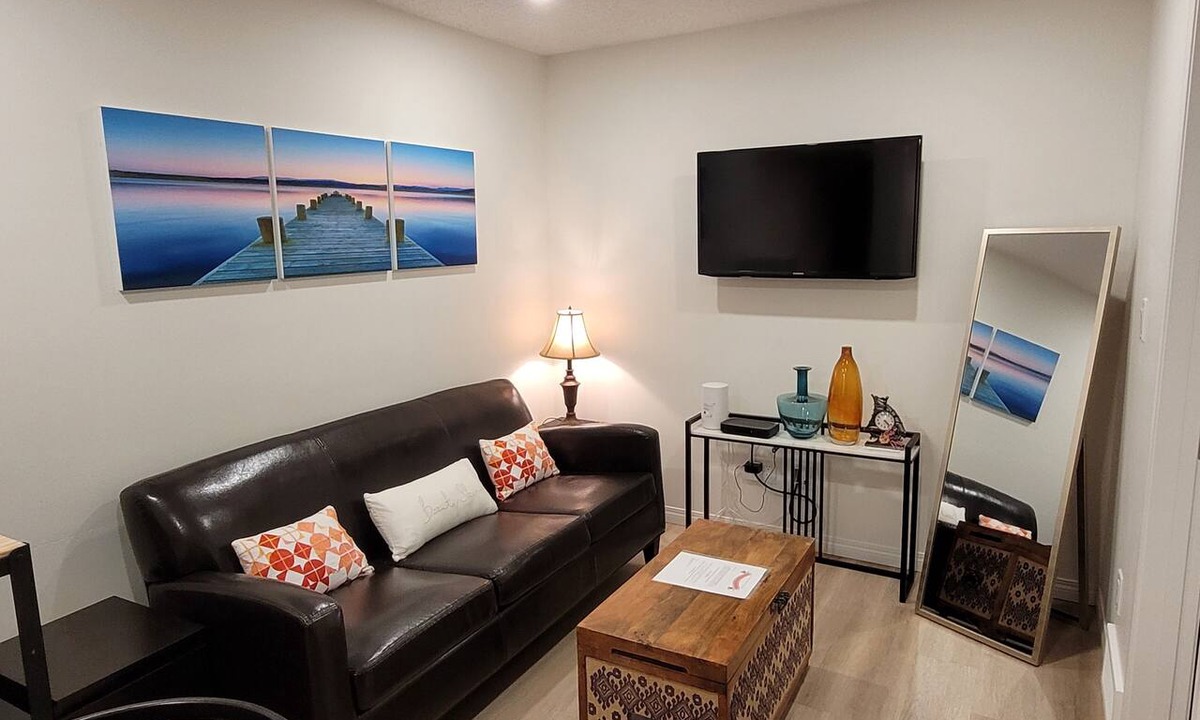 Southeast Calgary House | Cozy basement unit near restaurants, bars, stores, bus stations, and hospital.