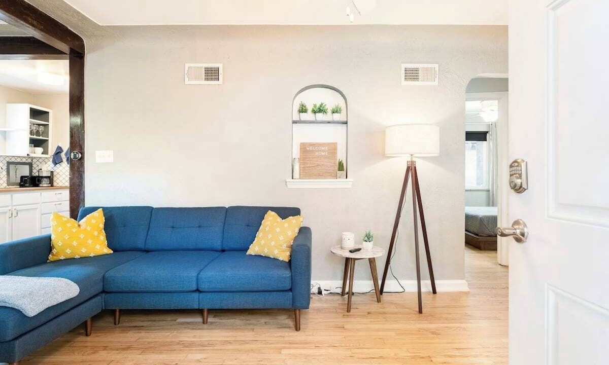 City Park House | Cozy Townhome Steps from City Park - Pet-Friendly Monthly Stays