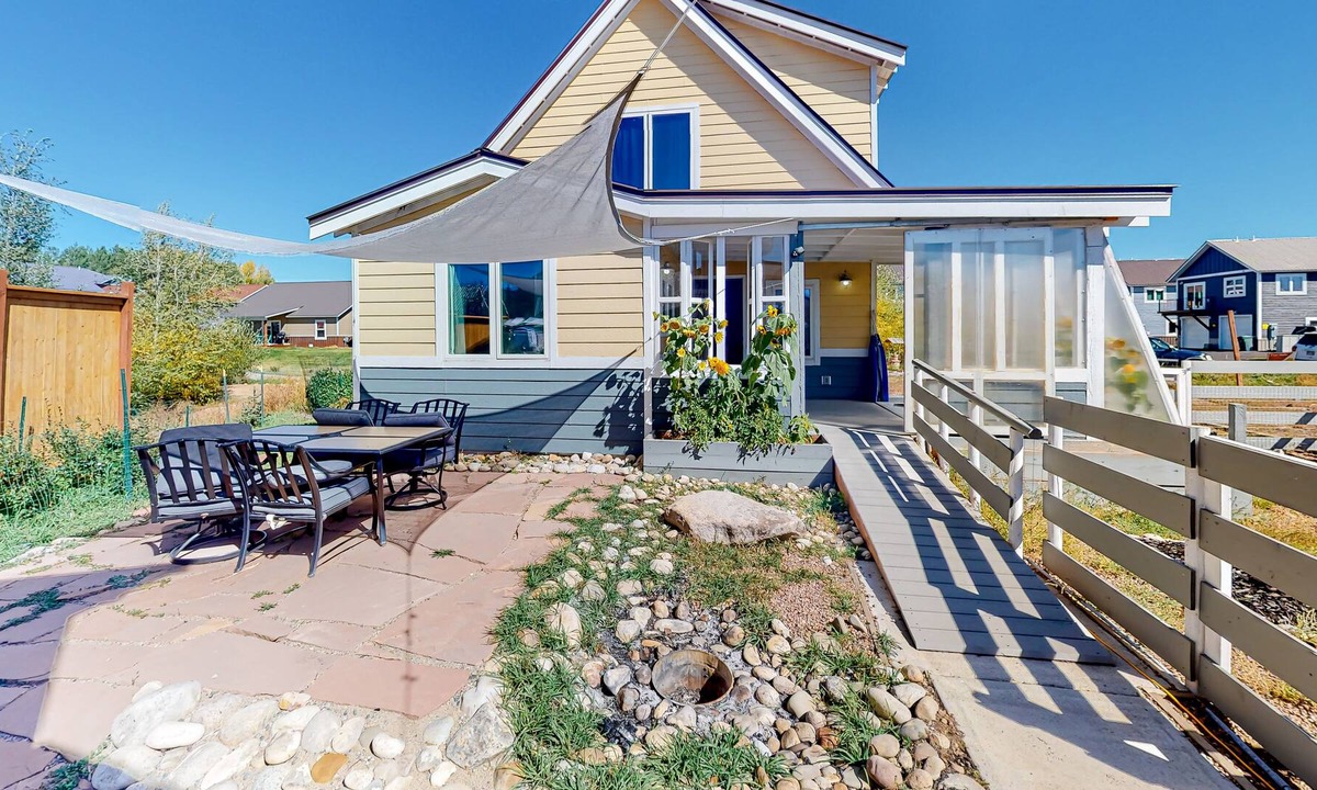 Gunnison House | Dog-friendly home with prime location, lovely patio, sun porch & WiFi
