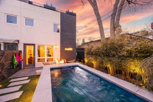 Sloan Lake House | Luxury Oasis Heated Pool Rooftop Spa Fire Pits