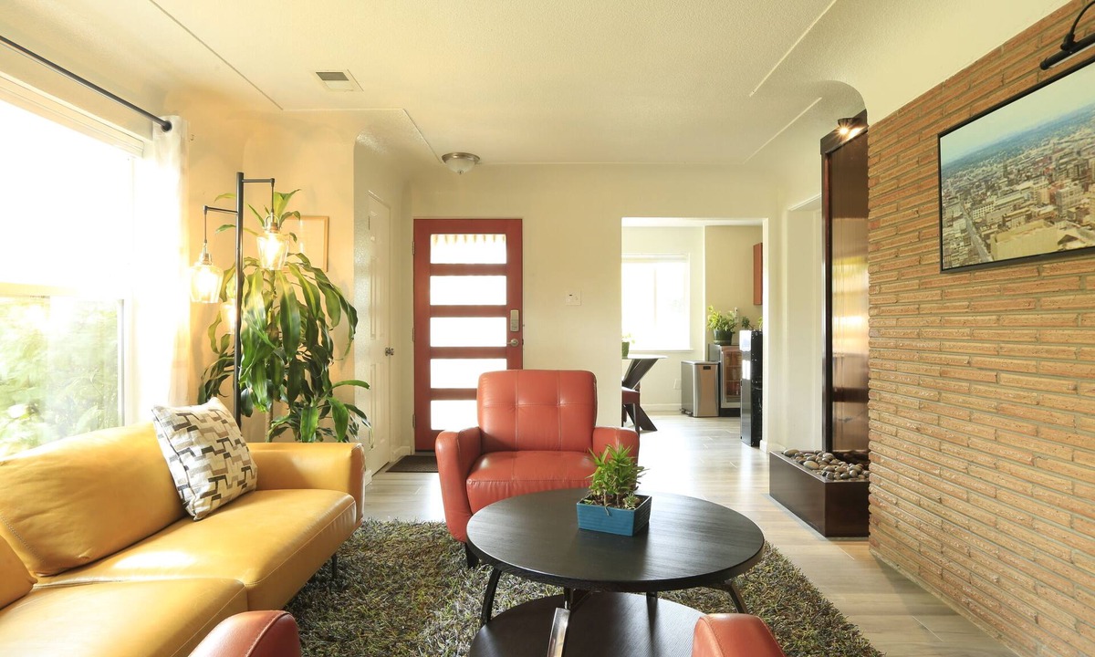 Lakewood House | Mid-century brick ranch house, centrally located, with Hot tub