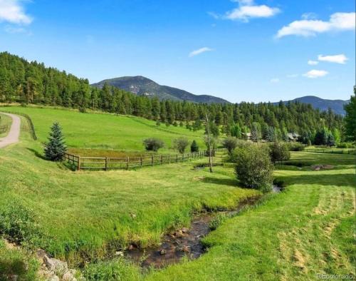 Evergreen House | Modern barn by the creek