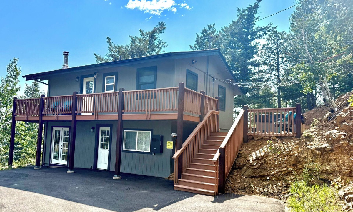 Evergreen House | Sky Mountain Retreat. Escape to the serene winter beauty of Evergreen, Colorado