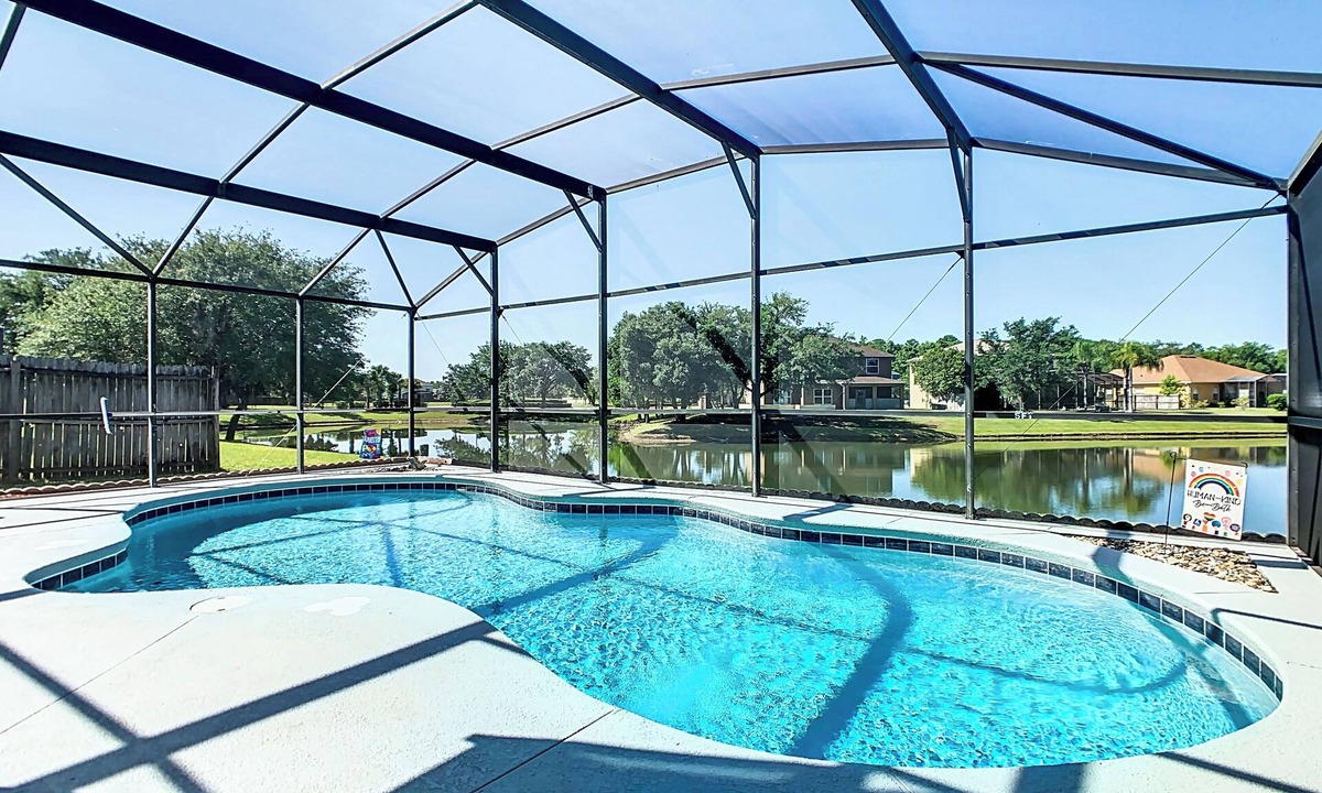 Crescent Lakes House | Smiling Disney Oasis heated pool home in Kissimmee with Game room.