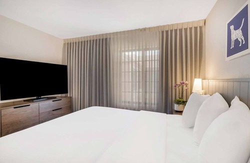Acres Green Hotel | 3 Family Ready Suites with Living Space Near Park Meadows | Outdoor Pool