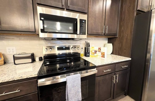 Bentonville Apartment | 7-Min Bike to Walmart Campus, Golf Sim, Sauna, Pets