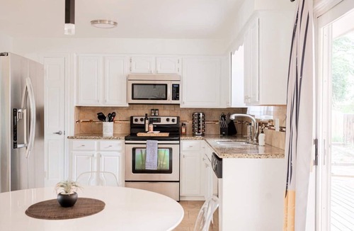 Lamar Heights Area House | Arvada Oasis! 7 beds, 2 Kings, 3 baths, desk, big TVs, air hockey, games!