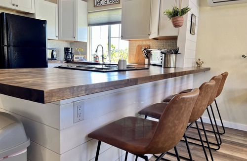 Clifton House | Barn house stay near Palisade, hot tub and views!