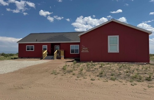 Alamosa House | Base Camp Ranch House. One-of-a-kind 3 bedroom, 4 bath house. Inside Alamosa's #1 Campground