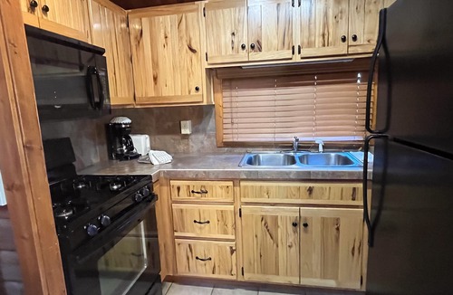 Almont Cabin | Beautiful 2 Bedroom Cabin on Taylor River with Private Hot Tub