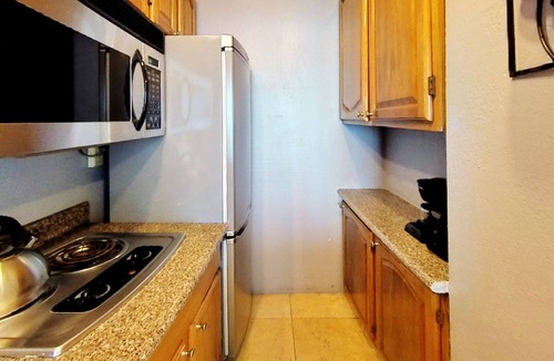 Mid Beach Condo | Castle 828 Oceanfront Studio with Balcony! Free Parking, Pool, Beach, Gym, Tennis, and more!