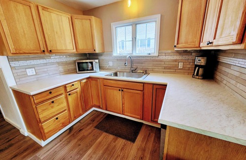Aberdeen House | Charming 1938 Pueblo Home with Game Room, Firepit and Boho Bedroom