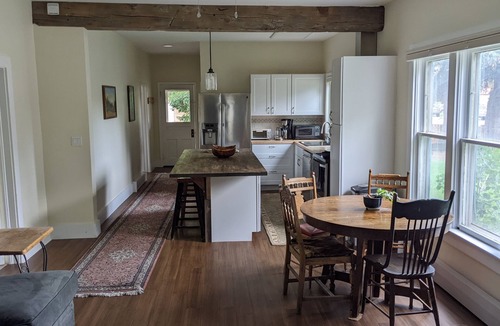 Gunnison House | Cheerful 3 bedroom in convenient location with a hot tub, sunroom and big yard.