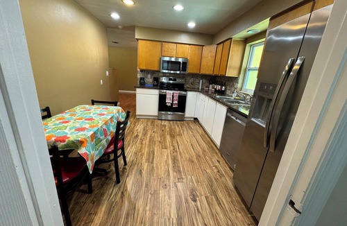 Palm Terrace Gardens House | Cozy Gulf Coast Getaway 3 BR 2 BA house in charming Port Richey with WiFi, AC.