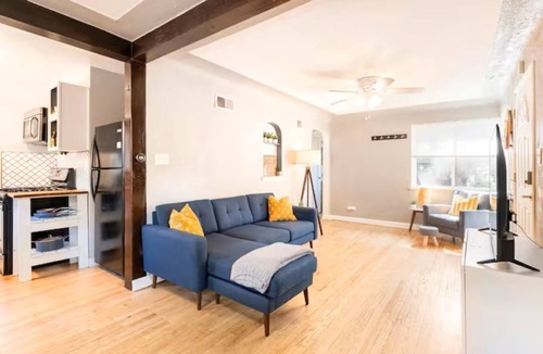 City Park House | Cozy Townhome Steps from City Park - Pet-Friendly Monthly Stays
