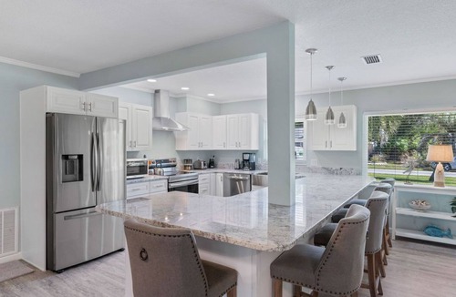 Indian Waters House | Crystal River Pool Home ~ Waterfront w/Boat Dock, Hot Tub & fenced backyard.