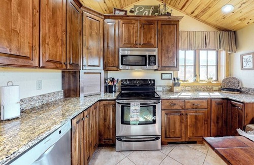 South Fork House | Dog-friendly riverfront retreat with hot tub, stunning views & screened porch