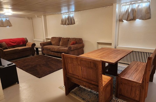 Craig Apartment | Downstairs apt, 2 beds, 3/4 bath, kitchen, washer/dryer. Walk to restaurants.