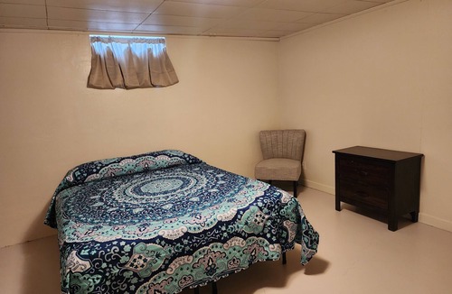 Craig Apartment | Downstairs apt, 2 beds, 3/4 bath, kitchen, washer/dryer. Walk to restaurants.