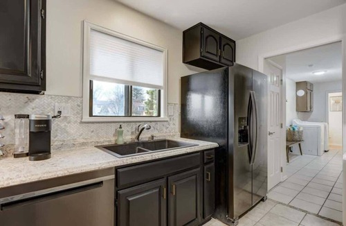 Park Vista House | Evergreen Luxe! Backyard Oasis w/Pool & Hot Tub!