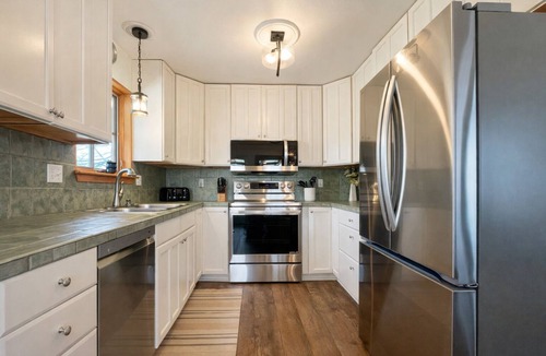 Cedar Village House | Family-Friendly Home Near Trails w/Yard & Hot Tub