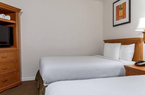 Florida Central Atlantic Coast Hotel | Family Friendly Stay Near Disney! Cozy Suite w/Kitchen, Pool, & Free Parking!