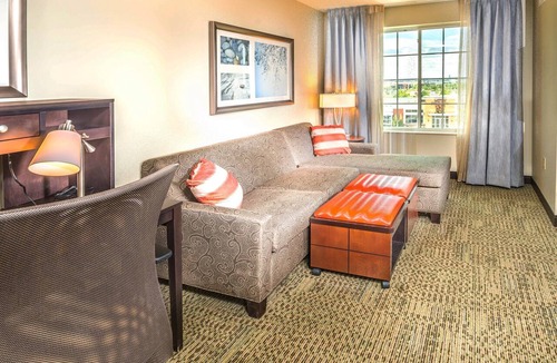 Northfield Apartment | Free Breakfast Buffet & Pool Access. Near University of Colorado Hospital.