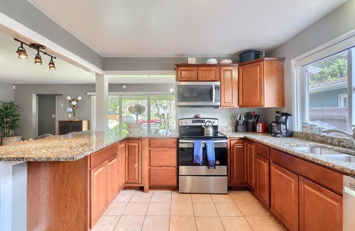 East Colfax House | Grey Brick Home Close to Central Park & Anschutz Medical Campus