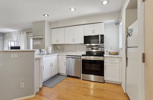 Baker Condo | Hip Historic Baker Area Condo - Individual Garage Parking Included!