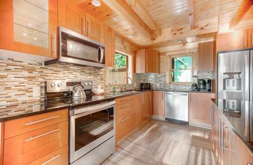 Gatlinburg Cabin | Homey Cabin with Private Hot Tub, Free Attraction Tickets, Pool Table, & AC