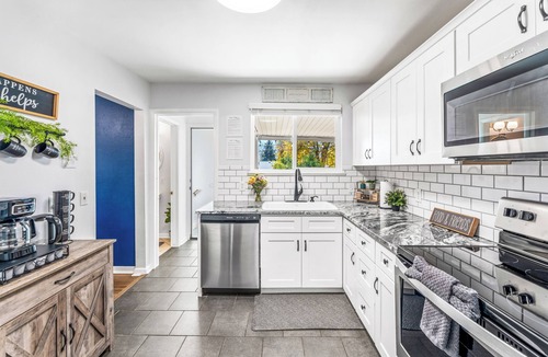 Arvada Plaza Area House | Hot Tub + Games | Epic 6BR Group Home in Arvada