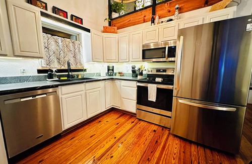 Sylvan Shores House | Lakefront w/hot tub, firepit, BBQ, smoker, kitchen, patios, king bed, 1.5 bath