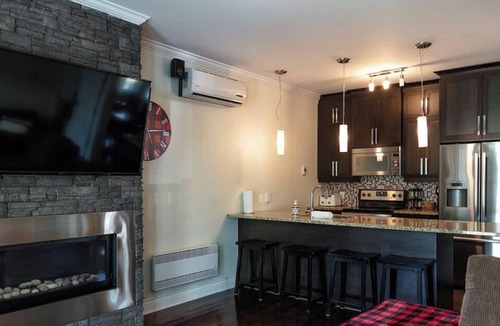 Bromont Condo | Le Champlain 101 Duplex avec Piscine by Alchalet