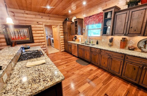 Almont House | Log Home on the East River w/Fish Access | 3 Bedroom | Gas Grill | Firepit