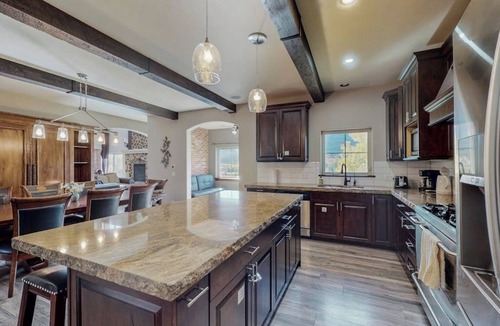 Gypsum House | Luxe home on Gypsum Creek Golf Course with fireplace and mountain views