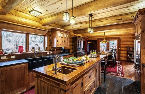South Fork Hotel | Luxurious log cabin with river views, hot tub, firepit, outdoor areas, & W/D