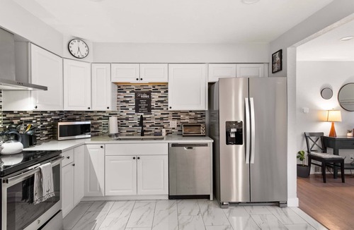 Lamar Heights Area House | Modern 4BR Retreat: Private Yard - 10 Min to DEN