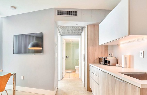 West Avenue Condo | Modern Boutique W/Balcony, Roof Pool & Terrace II