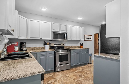 Bentonville House | Mural House B: Private Hot Tub > On The Trails > Fire Pit > EV Charger