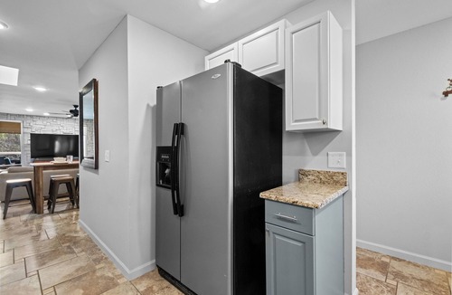 Bentonville House | Mural House B: Private Hot Tub > On The Trails > Fire Pit > EV Charger