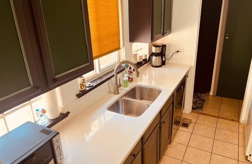 North Park Hill House | Pet Friendly Retro Oasis in Central Park/Park Hill. 2 bd w/dedicated work space