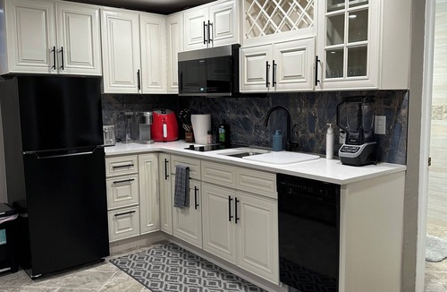 Aurora Apartment | Private entrance and outside patio. Centrally located in a quiet neighborhood.