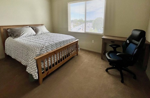 East End Apartment | Private room in modern building top floor corner. Greenbelt and mountain views!