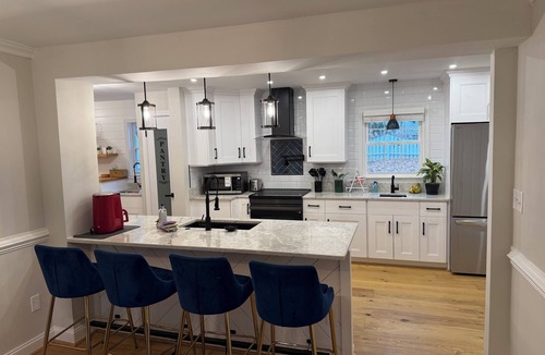 Gloucester Point House | Relax in our renovated get away that is only steps away from a secluded beach.