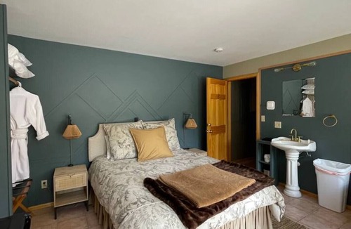Twin Lakes Cabin | Romantic Twin Lakes lodge room with queen bed, porch & lake views
