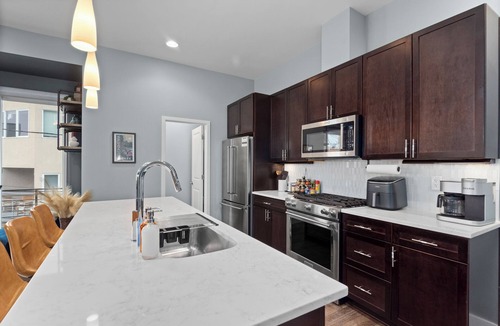 Sloan Lake House | Rooftop Escape featuring City & Mountain Views a Short Walk to Empower Field!
