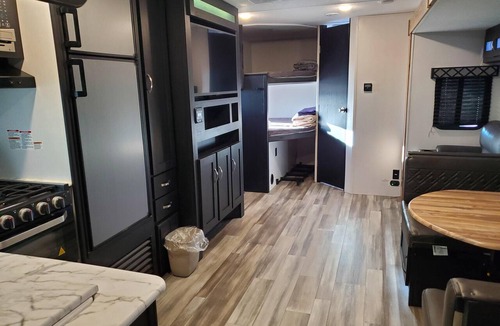 Penrose House | Saturn Camper Suite - Family planet camper with bunk beds, sleeps six