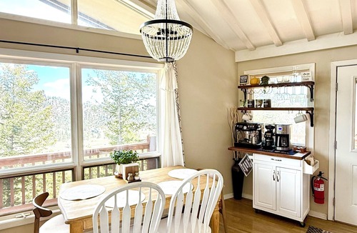 Evergreen House | Sky Mountain Retreat. Escape to the serene winter beauty of Evergreen, Colorado