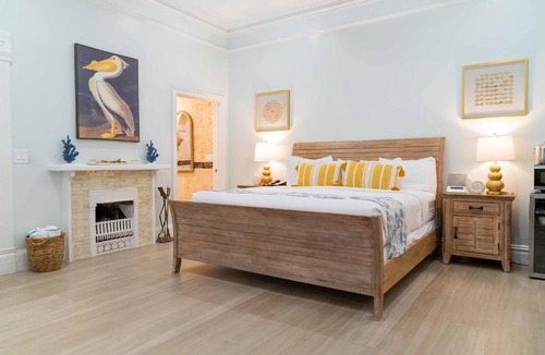 Uptown - Upper Duval Bed & Breakfast | Southernmost Point Guest House & Garden Bar